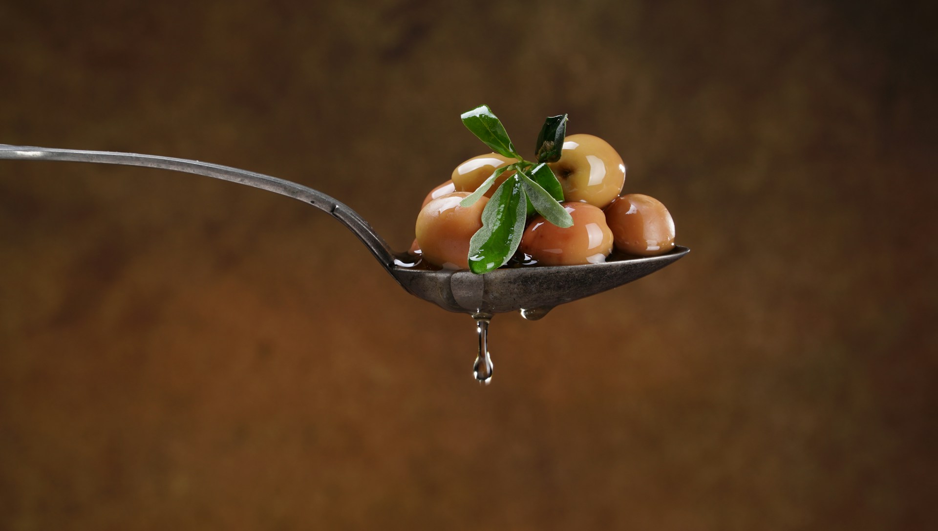 Olives in a spoon